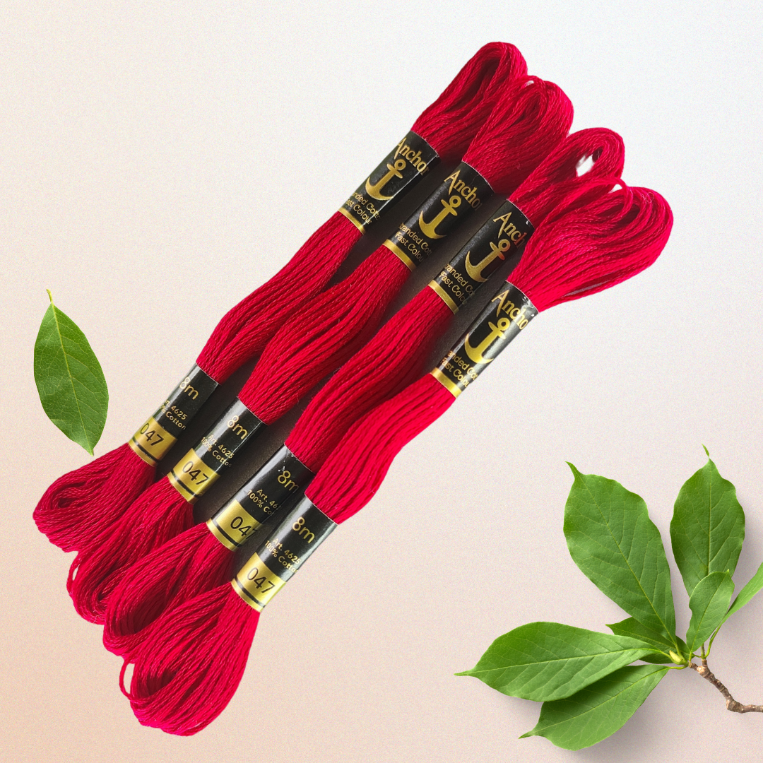 Anchor Embroidery Thread 047 in vibrant red color
