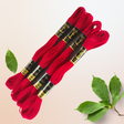 Anchor Embroidery Thread 047 in vibrant red color