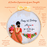 An inforgraphic of embroidery hoop artwork decorated with white pearls and cream-colored bow on top with an embroidered girl image holding flowers and description of creative expression of your thoughts